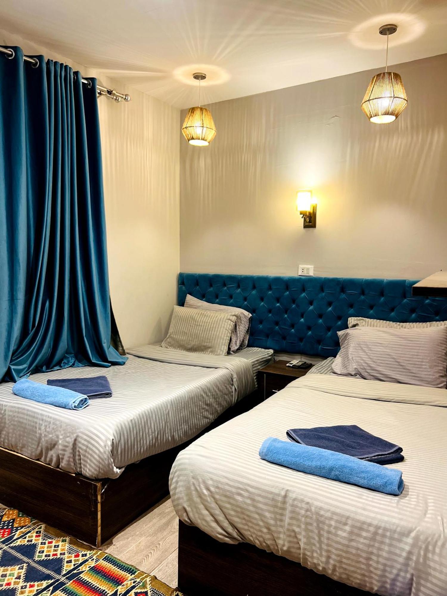 Grand Pyramids Inn Kafret el-Gabal المظهر الخارجي الصورة